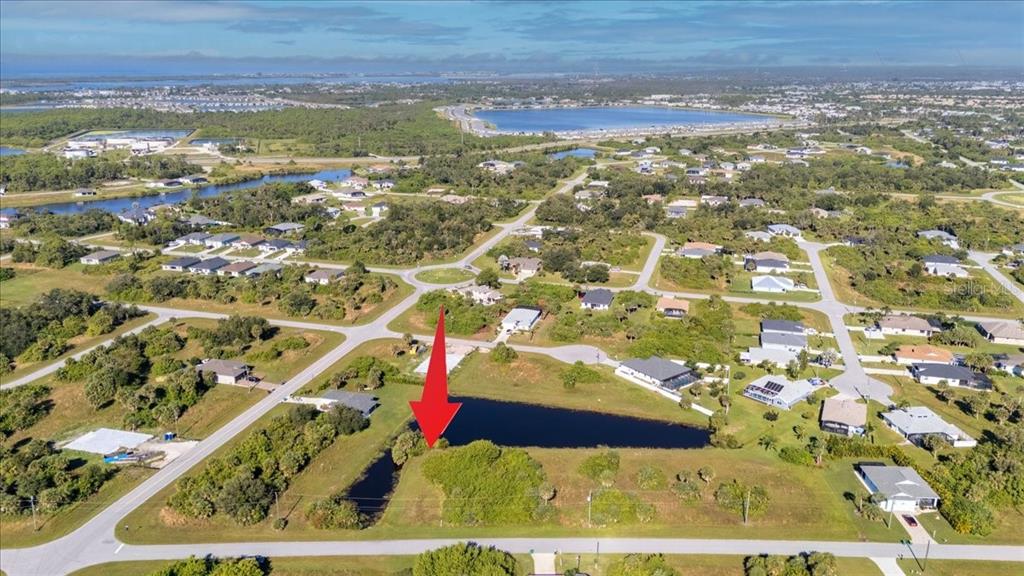 155 Spring Drive Rotonda West, FL 33947 - Photo 10 of 12 a view of a city