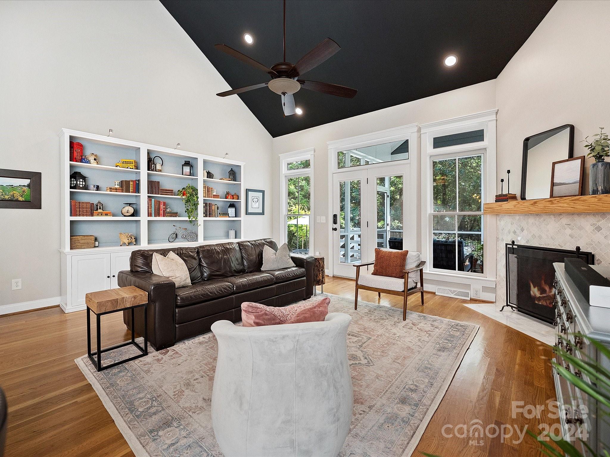 7132 Michael Scott Crossing Fort Mill, SC 29708 - Photo 17 of 41 a living room with furniture and a fireplace