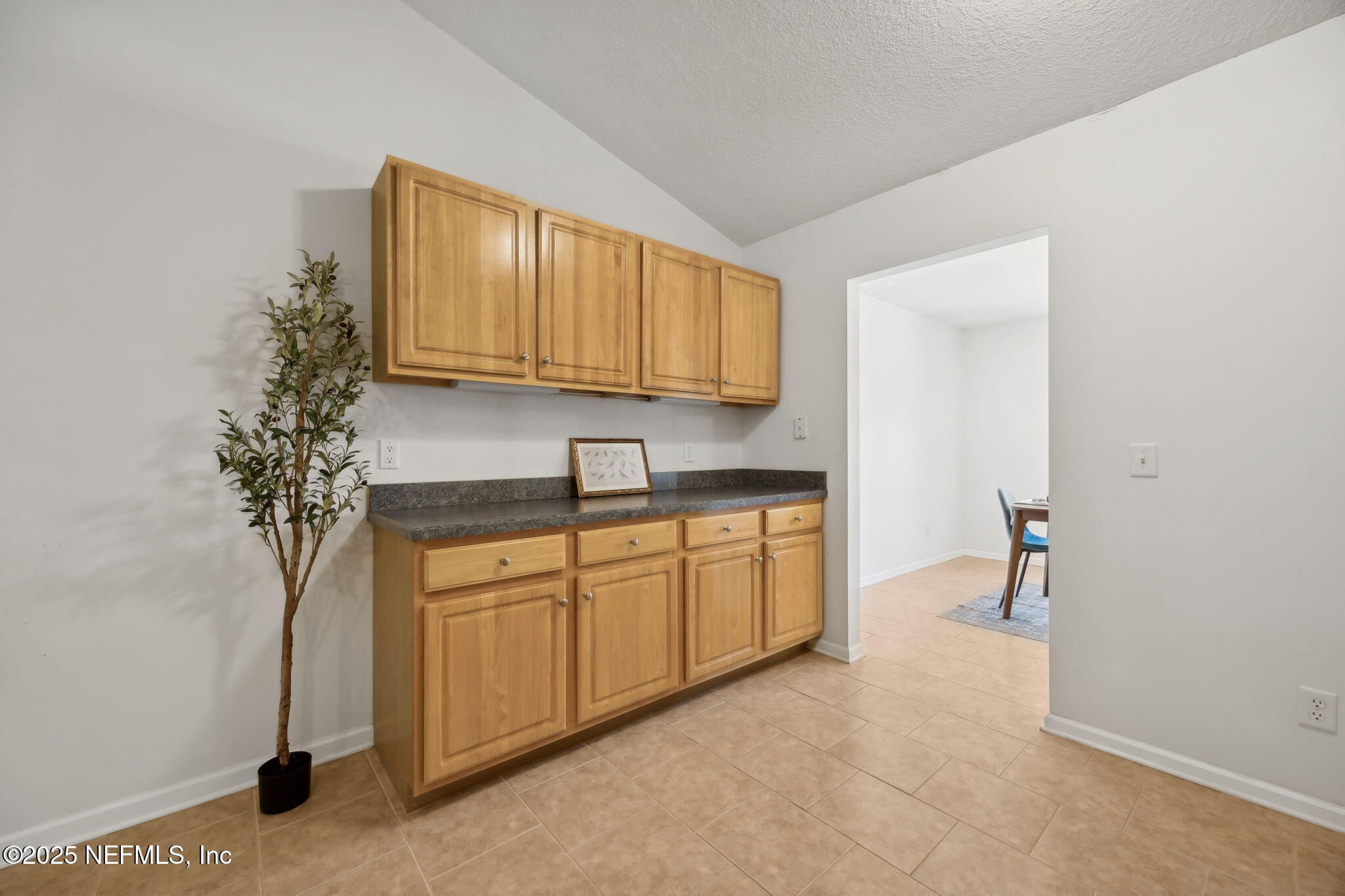 36 Currant Avenue Middleburg, FL 32068 - Photo 21 of 59 a kitchen with stainless steel appliances granite countertop a sink and a stove