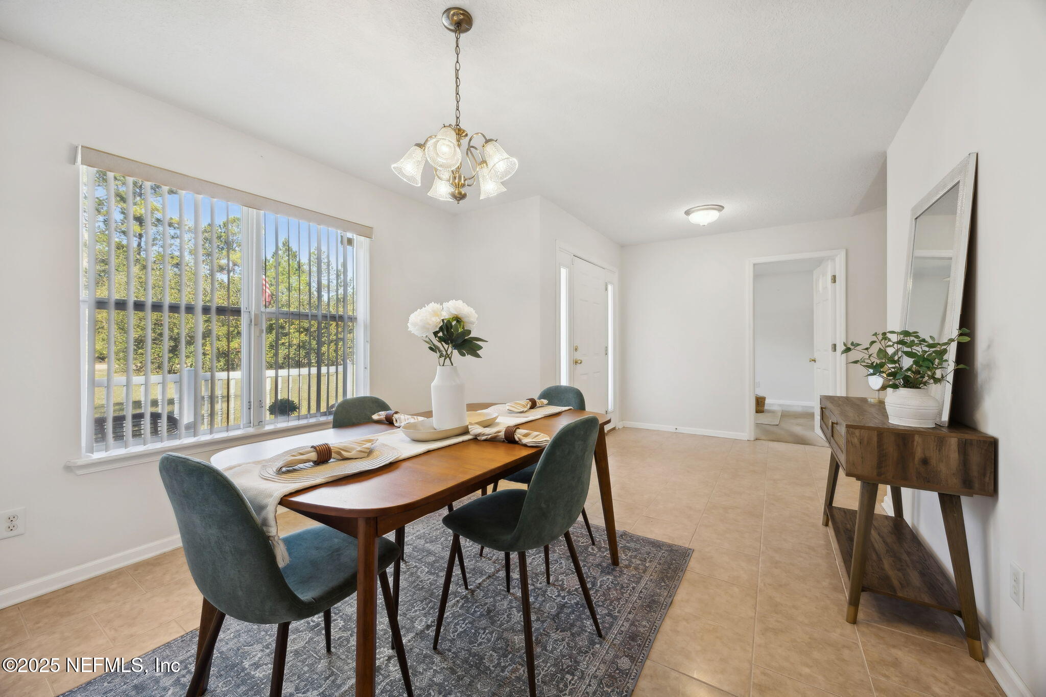 36 Currant Avenue Middleburg, FL 32068 - Photo 23 of 59 a view of a dining room with furniture window and outside view