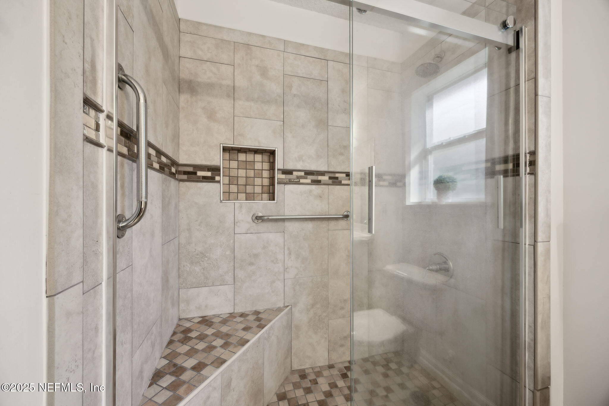 36 Currant Avenue Middleburg, FL 32068 - Photo 30 of 59 a bathroom with a shower