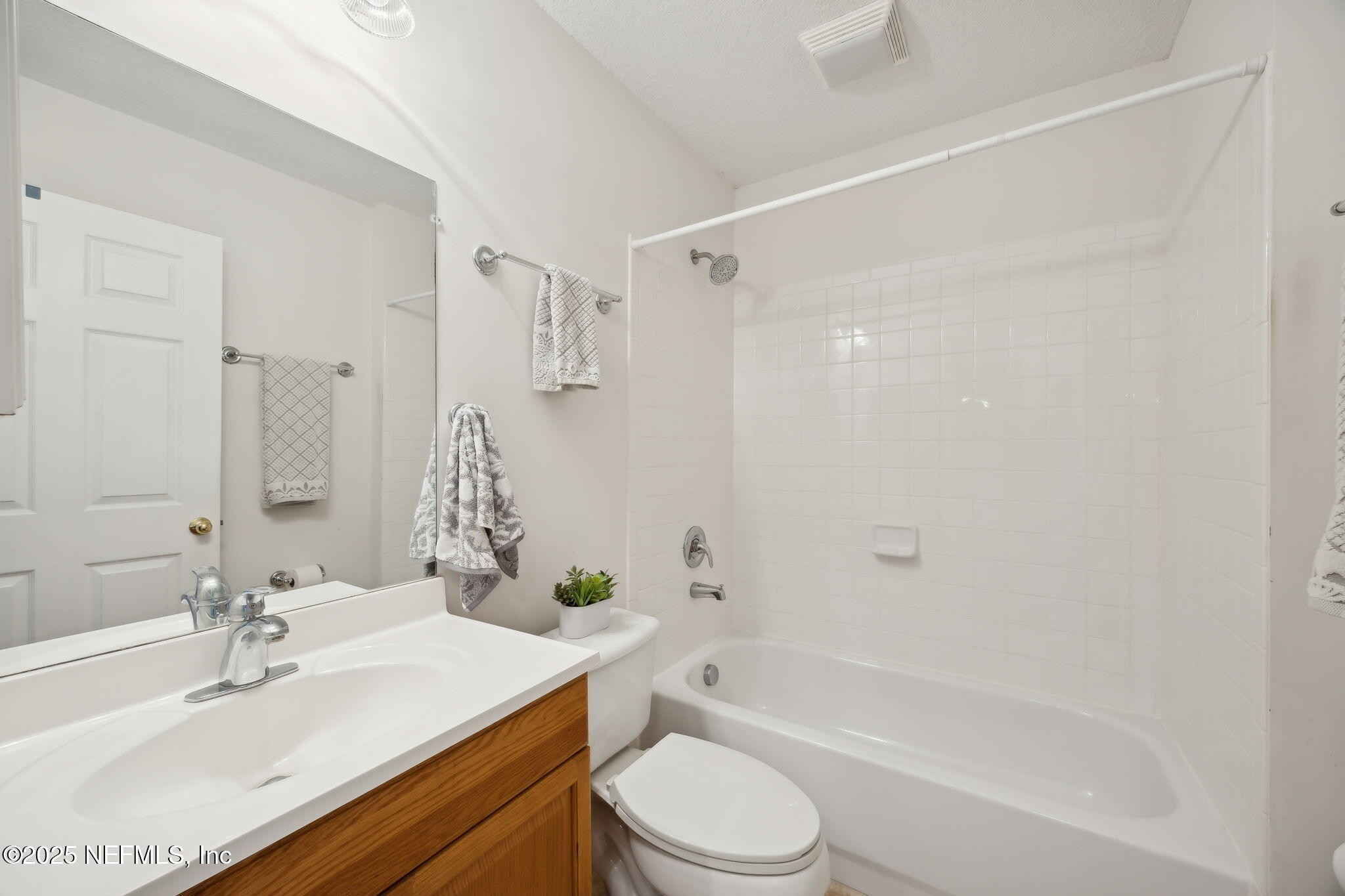 36 Currant Avenue Middleburg, FL 32068 - Photo 35 of 59 a bathroom with a sink a toilet and shower