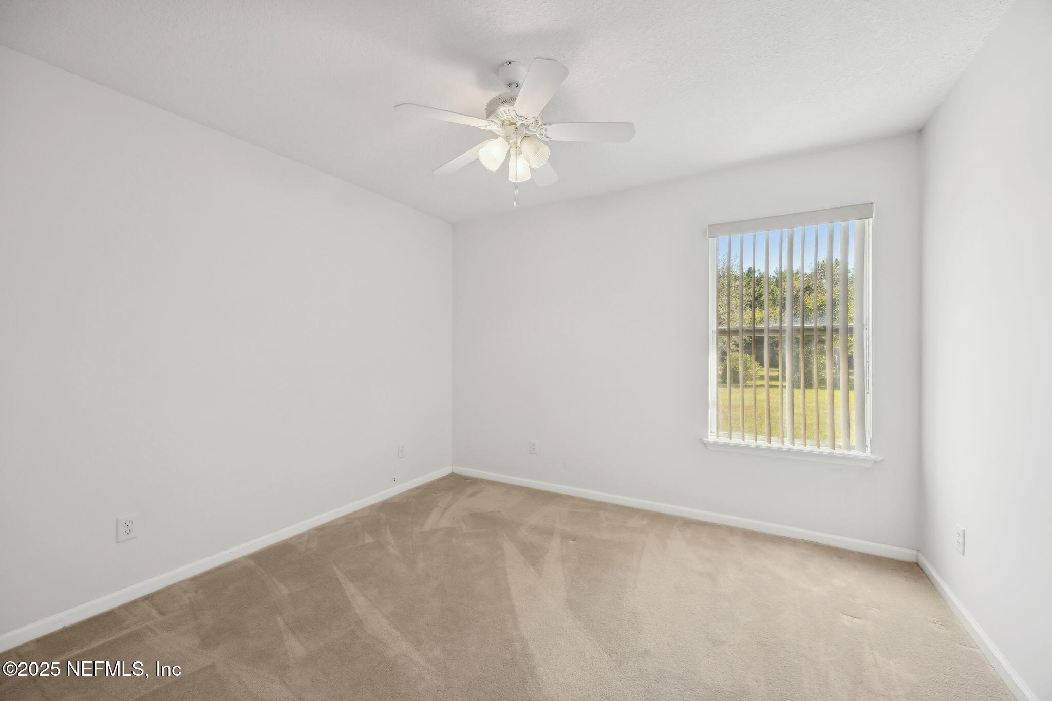 36 Currant Avenue Middleburg, FL 32068 - Photo 36 of 59 an empty room with a window