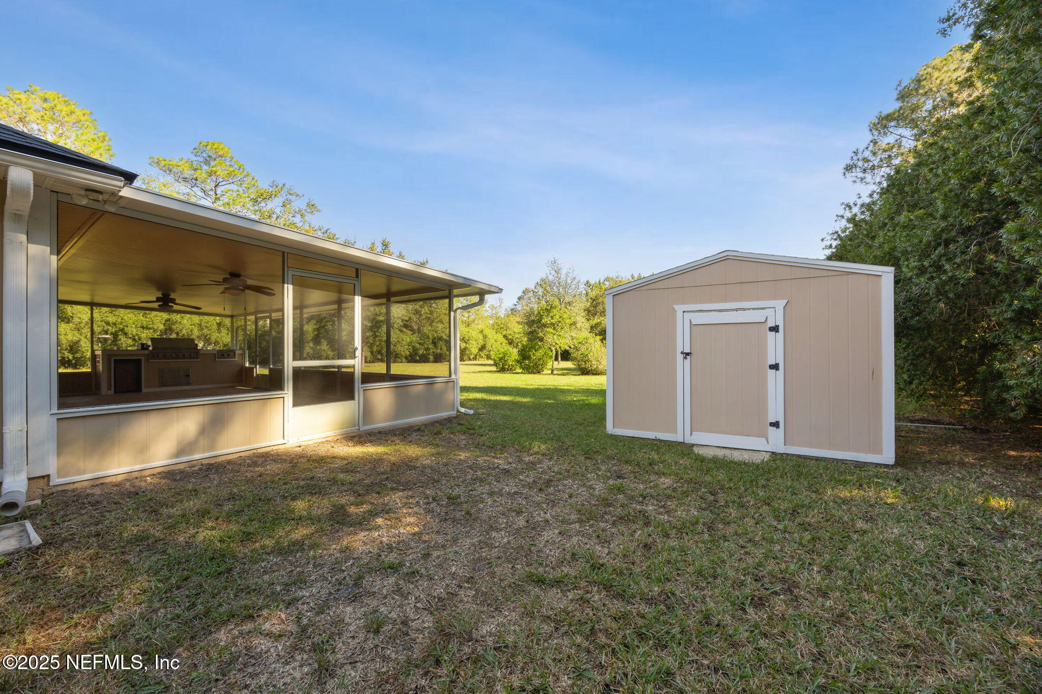 36 Currant Avenue Middleburg, FL 32068 - Photo 43 of 59 a view of a house with backyard and garden