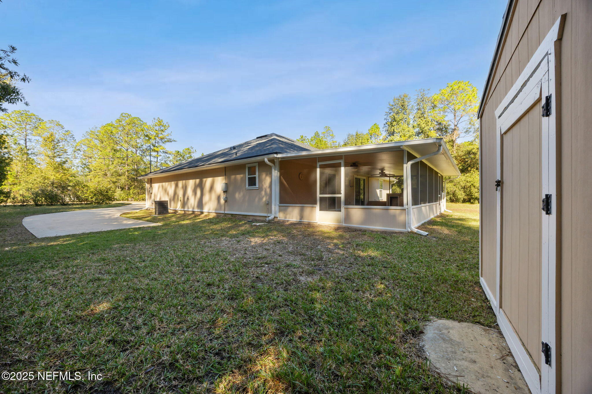 36 Currant Avenue Middleburg, FL 32068 - Photo 44 of 59 a view of a house with a backyard