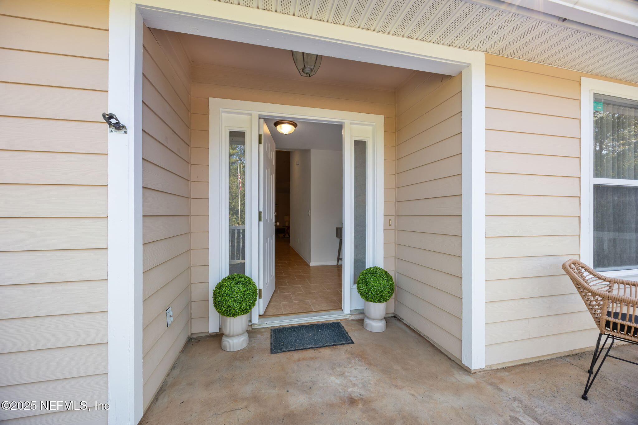36 Currant Avenue Middleburg, FL 32068 - Photo 8 of 59 a view of a door and chair door of the house