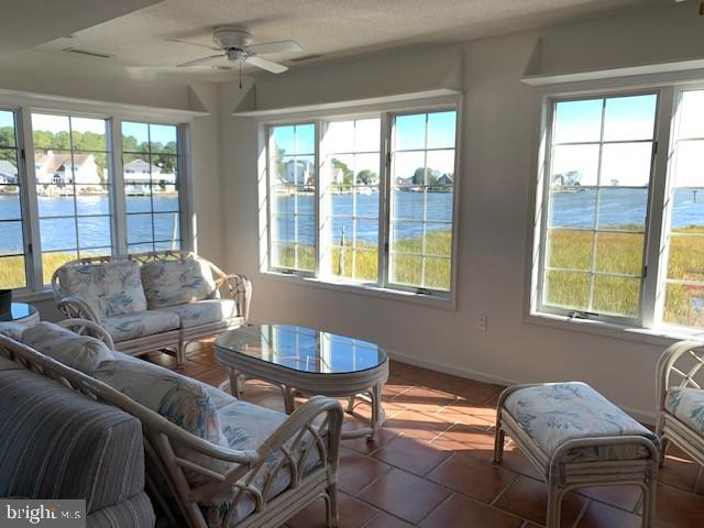 5 The Point Ocean Pines, MD 21811 - Photo 5 of 22 Sunroom 1st floor with tile flooring