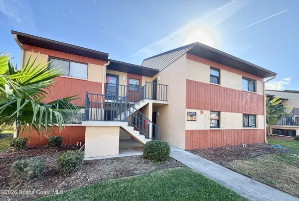 a house view with a backyard space