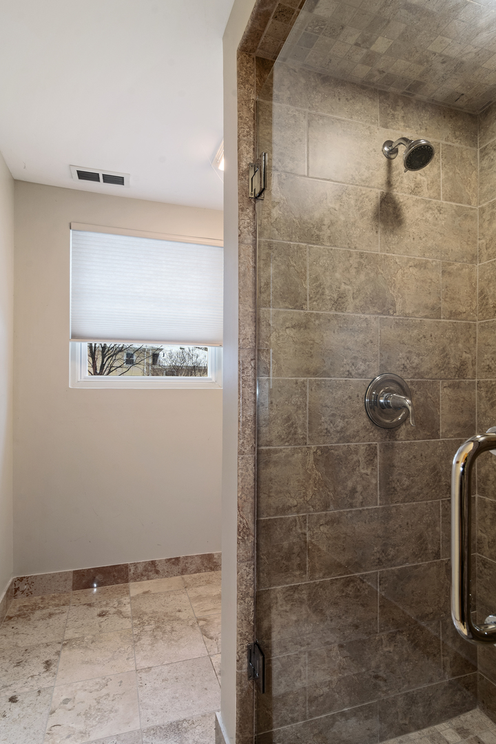 11S711 Book Road Naperville, IL 60564 - Photo 23 of 31 a bathroom with a shower
