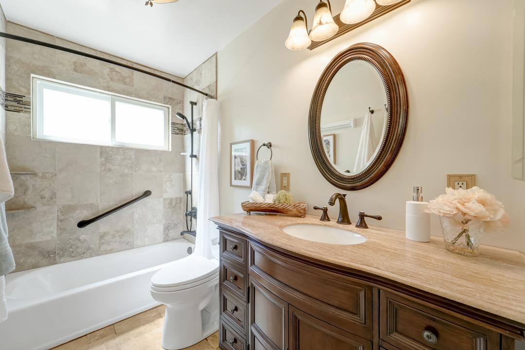 637 Laird Lane Lafayette, CA 94549 - Photo 24 of 44 a bathroom with a granite countertop toilet a sink and a bathtub