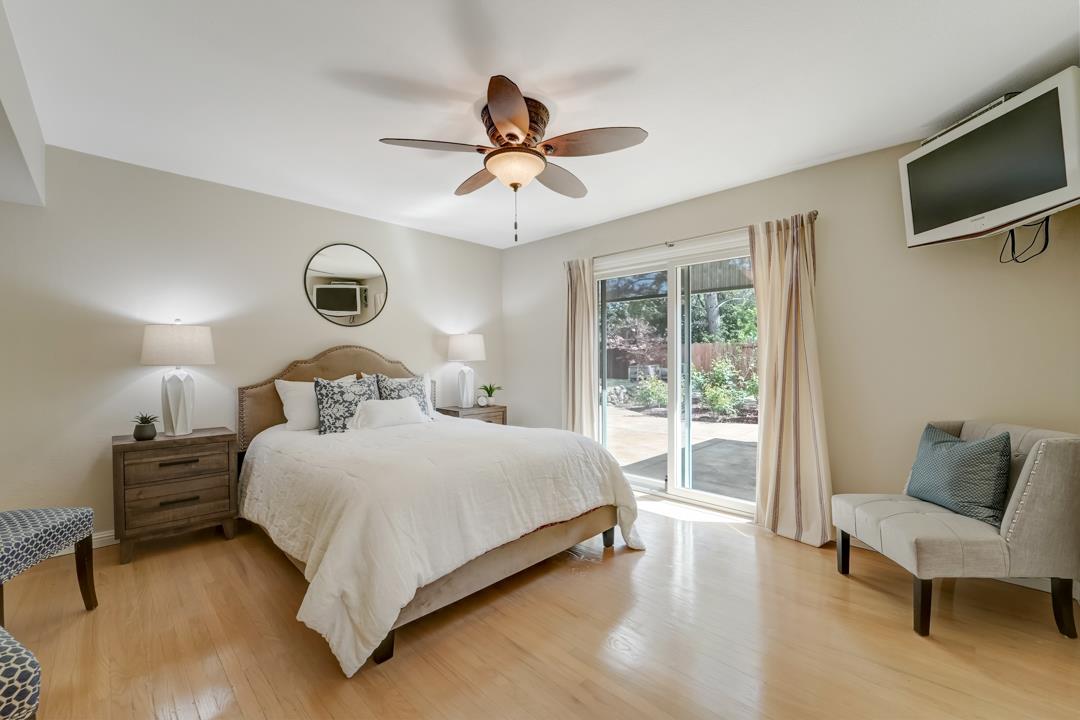 637 Laird Lane Lafayette, CA 94549 - Photo 25 of 44 a bedroom with a large bed and a tv