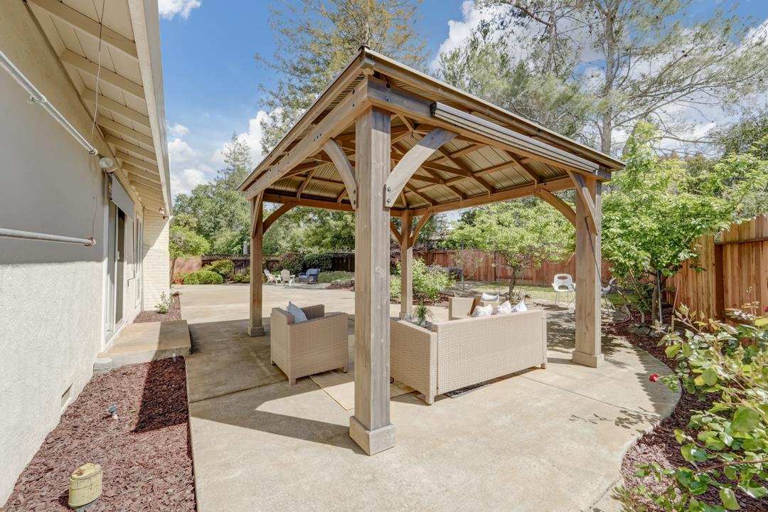 637 Laird Lane Lafayette, CA 94549 - Photo 33 of 44 a view of a patio with table and chairs and potted plants