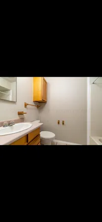 a view of kitchen and a sink