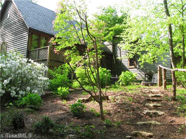 6111 Seward Road Pfafftown, NC 27040 - Photo 14 of 16 Exterior Back. The rear garden includes hydrangeas, hellebores, yew, azaleas, dogwood and Japanese maple, surrounding the patio.