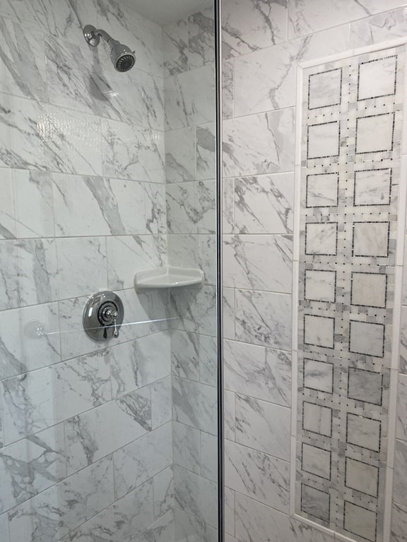210 Hillside Avenue, Unit 37 Needham, MA 02494 - Photo 10 of 14 a bathroom with a shower