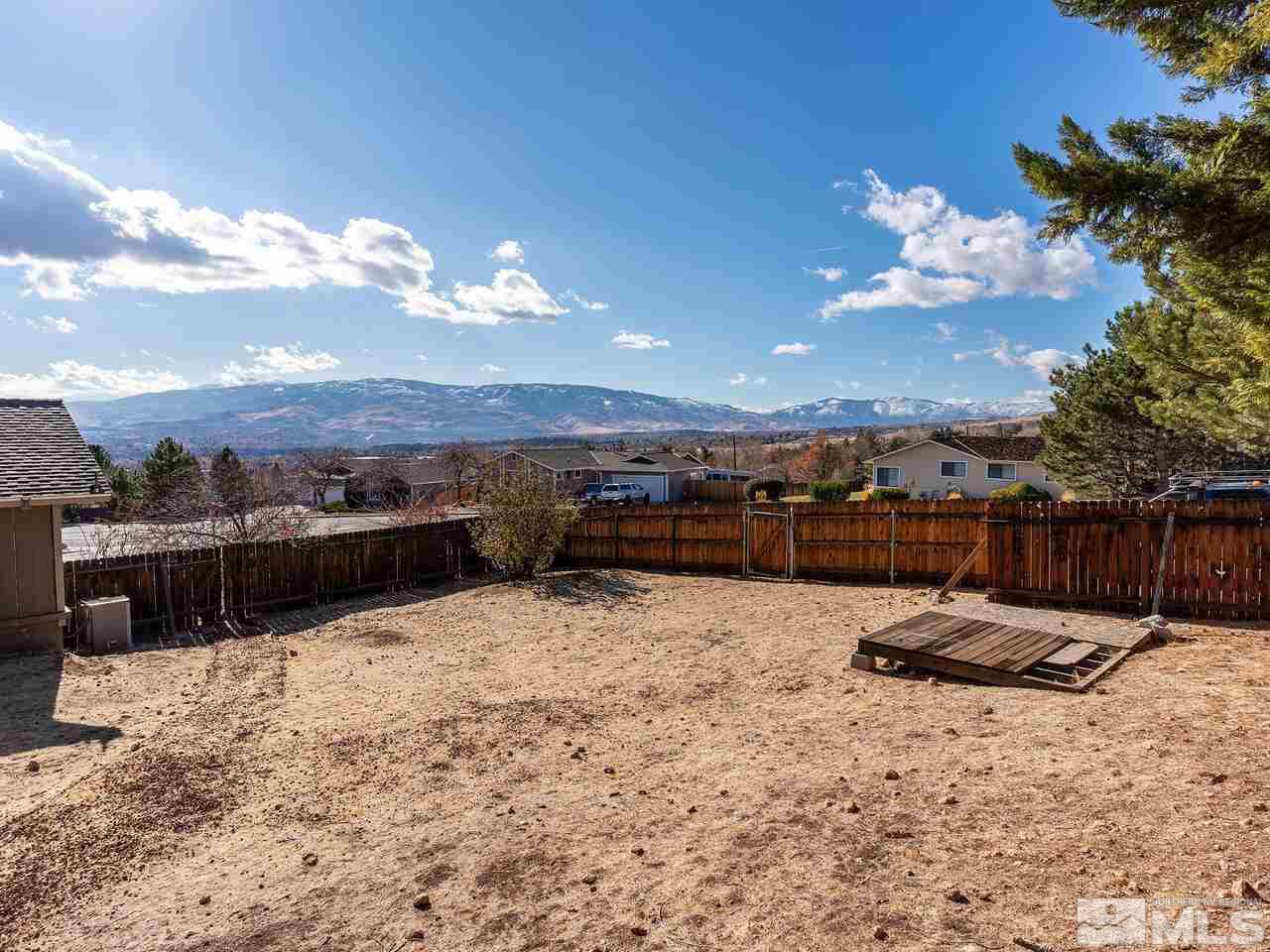 821 University Ridge Drive Reno, NV 89512 - Photo 26 of 28 a view of swimming pool with lounge chair