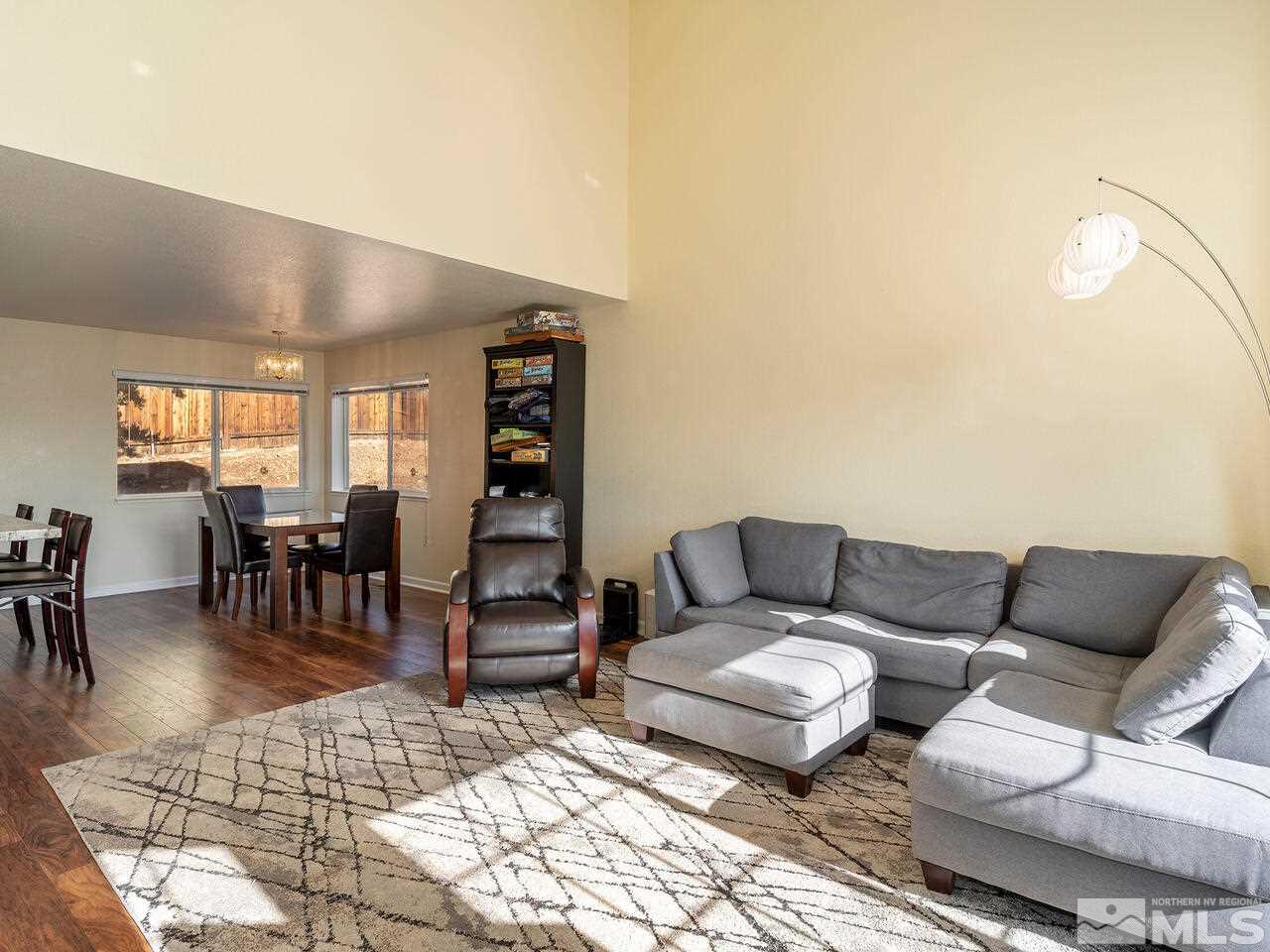 821 University Ridge Drive Reno, NV 89512 - Photo 9 of 28 a living room with furniture and wooden floor