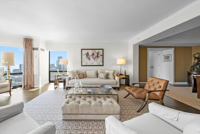 a living room with furniture or couch and a table