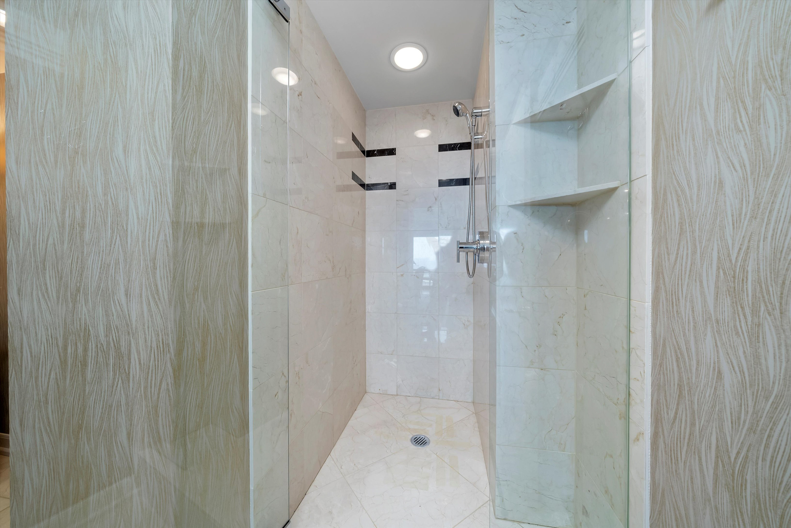 100 East Huron Street, Unit 4503 Chicago, IL 60611 - Photo 27 of 50 a bathroom with a shower