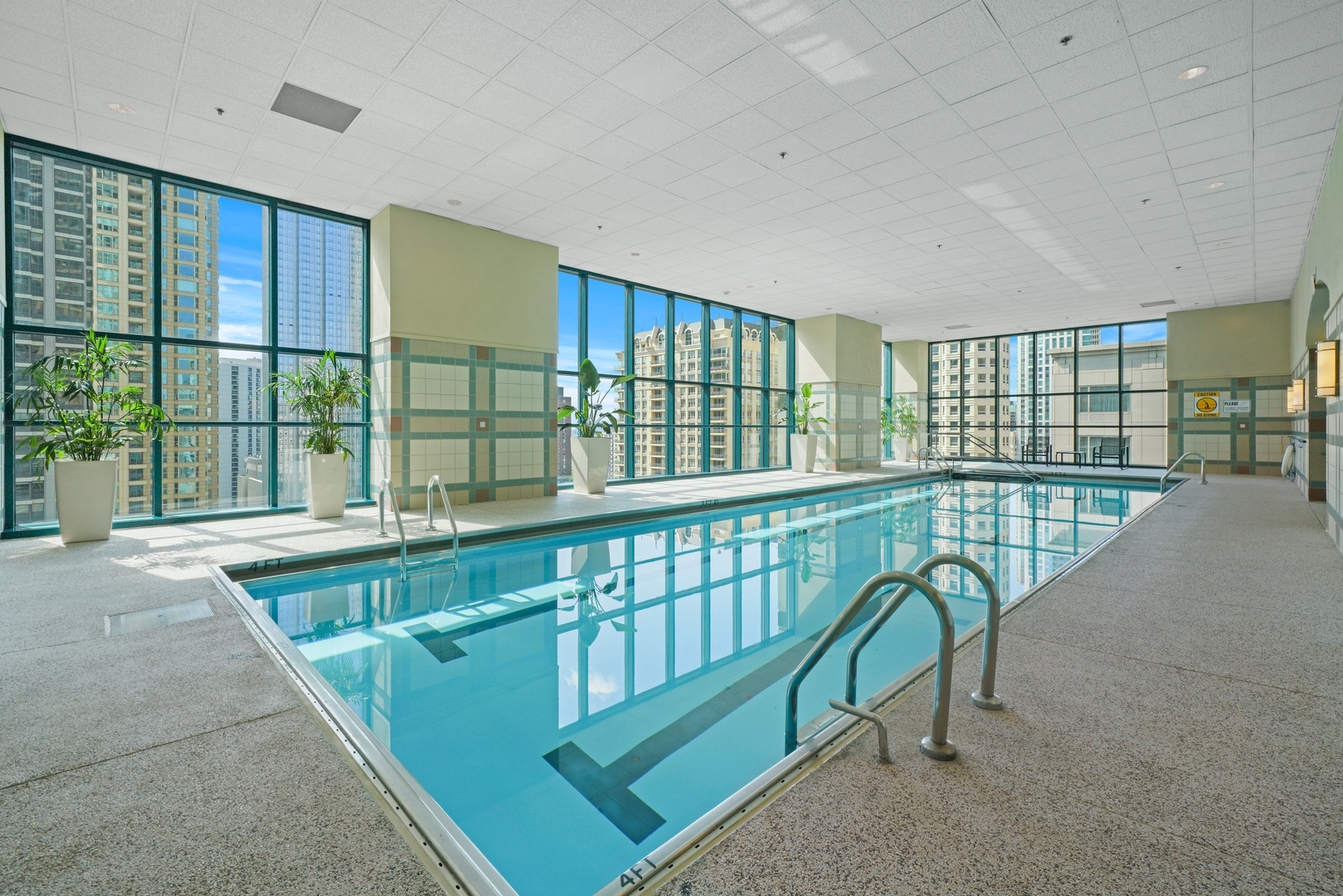 100 East Huron Street, Unit 4503 Chicago, IL 60611 - Photo 42 of 50 a view of a balcony with chairs