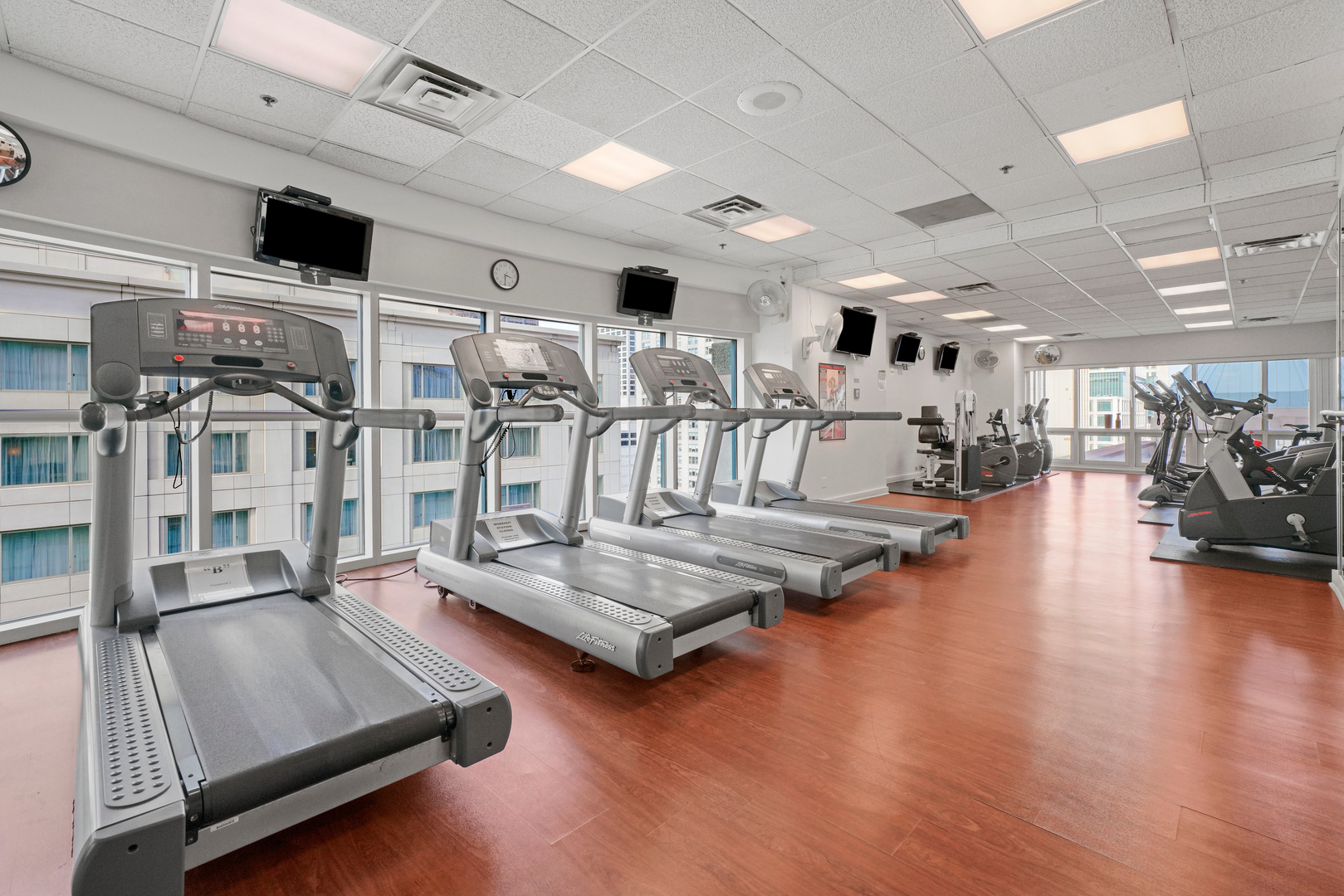 100 East Huron Street, Unit 4503 Chicago, IL 60611 - Photo 44 of 50 a living room with lots of gym equipment