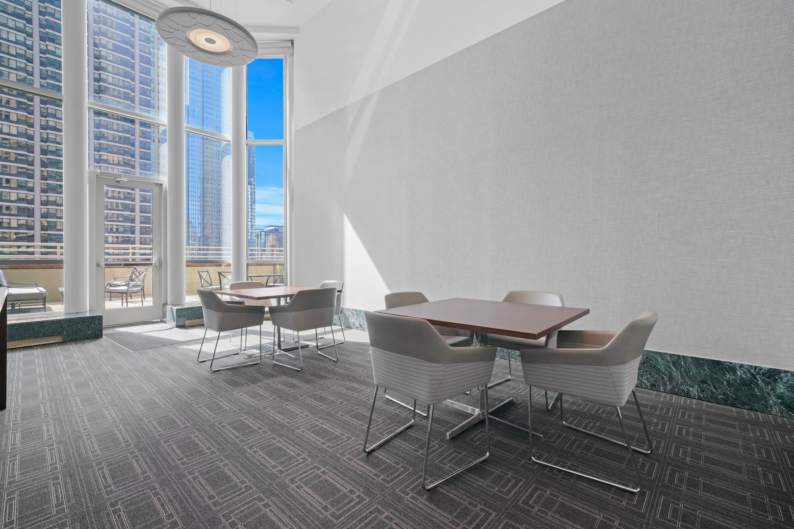 100 East Huron Street, Unit 4503 Chicago, IL 60611 - Photo 45 of 50 a workspace with furniture and a large window
