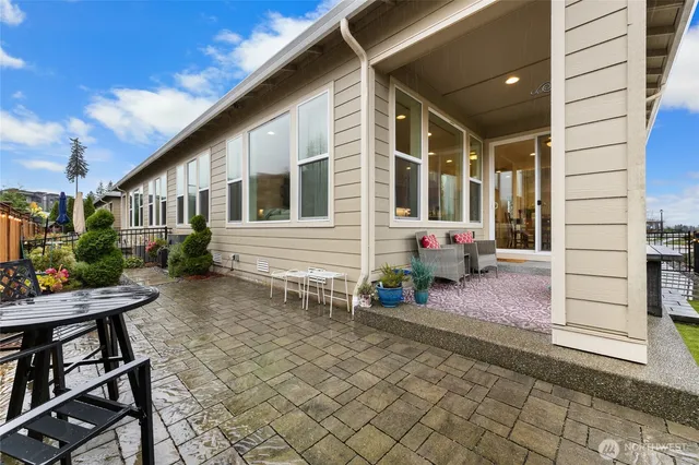 a front view of a house with patio
