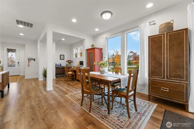 a view of a dining room with furniture