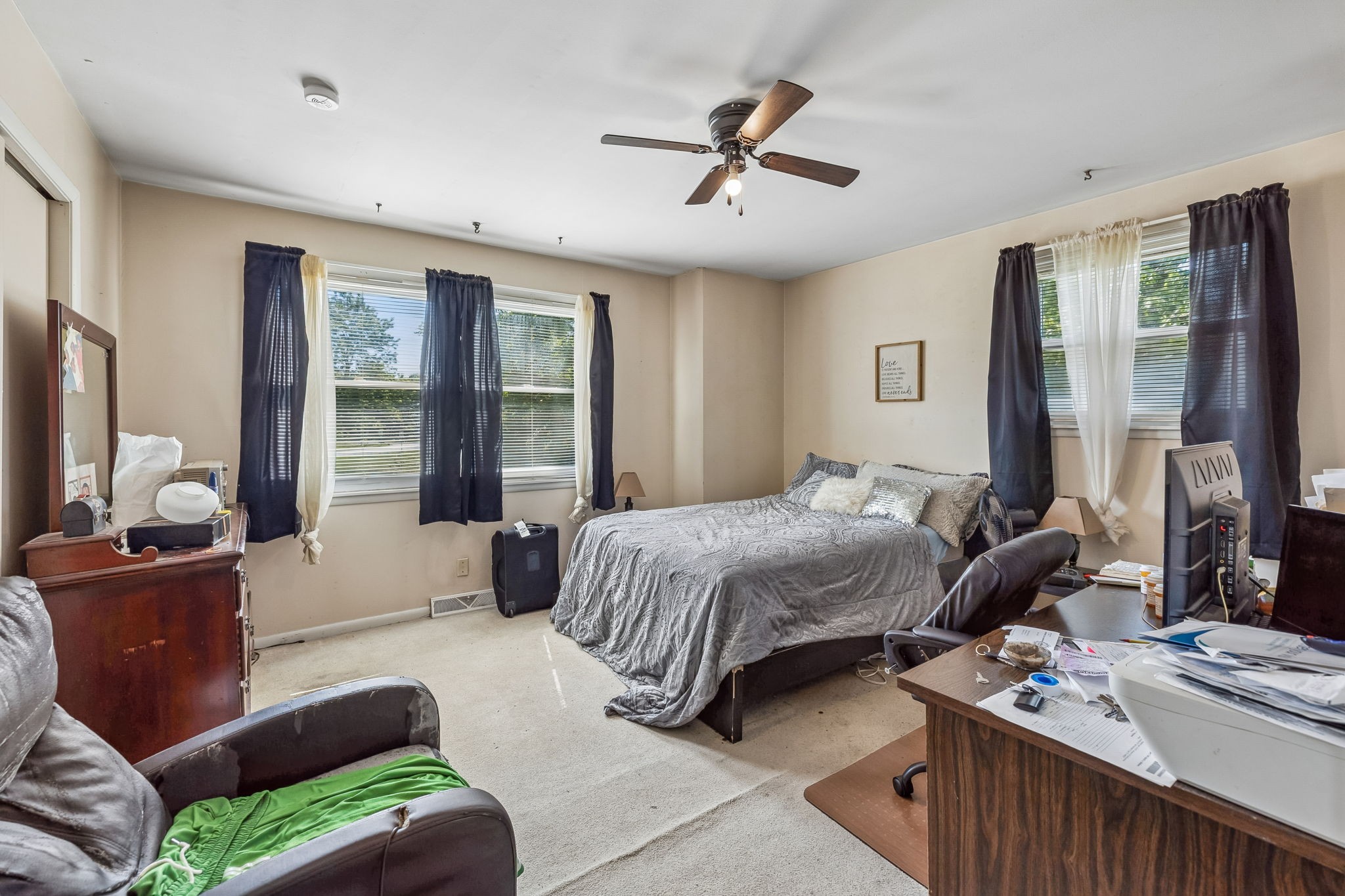 1246 Apache Lane Madison, TN 37115 - Photo 13 of 21 a bedroom with a bed a couch and a large window