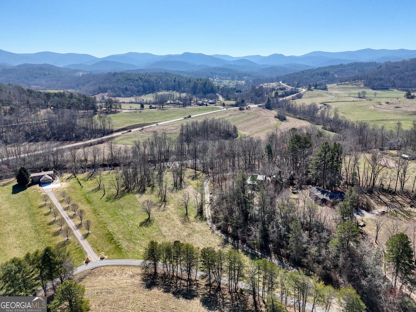 Lot 9 Riverside Blairsville, GA 30512 - Photo 24 of 35 a view of a lush green hillside and houses