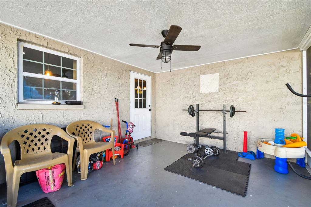 5831 1st Avenue New Port Richey, FL 34652 - Photo 19 of 22 a living room with furniture and a window