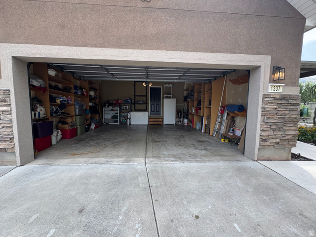 1237 South 260 West Payson, UT 84651 - Photo 80 of 81 Integrated garage with concrete flooring and built-in storage shelving