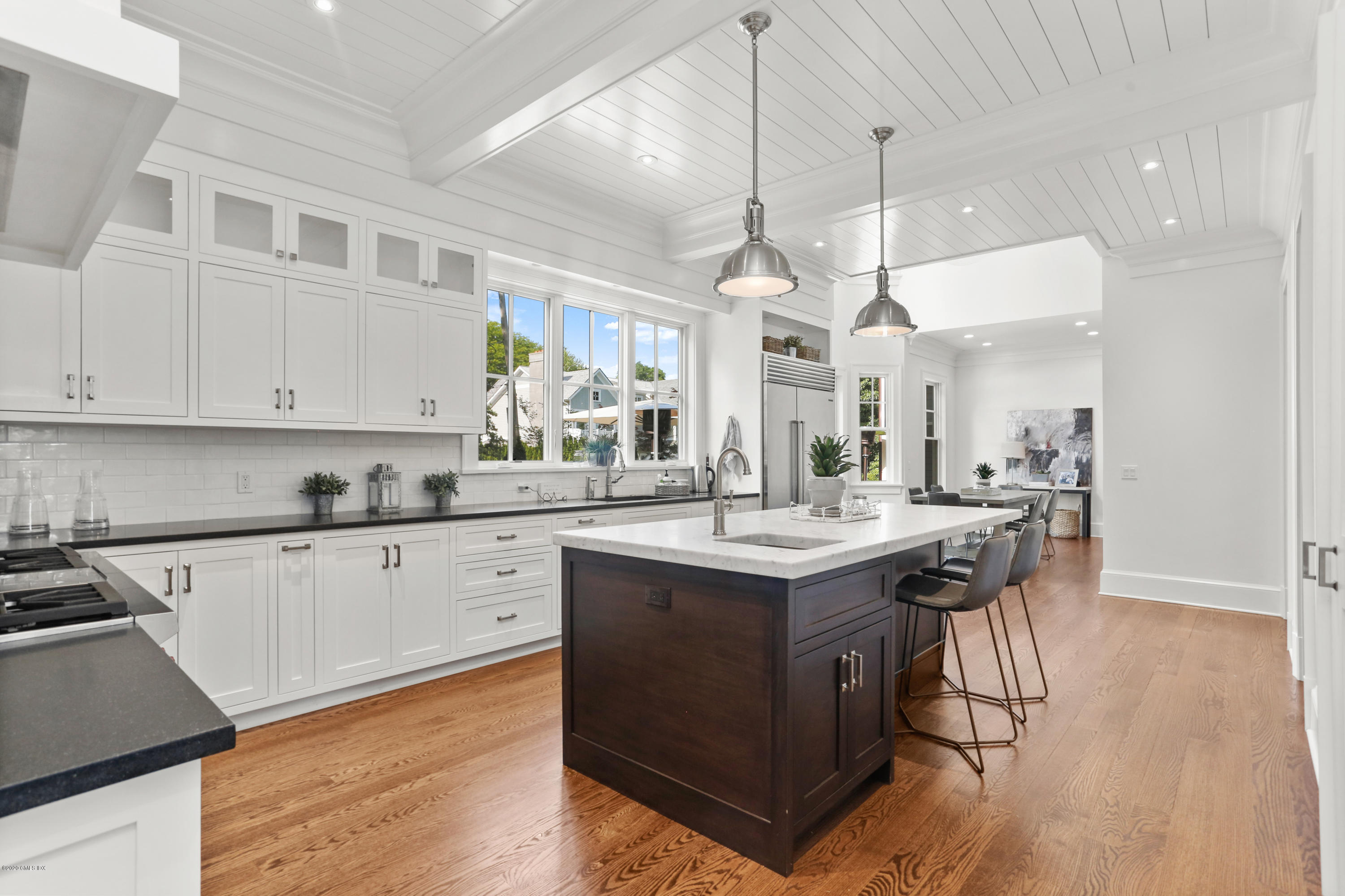 3 Juniper Lane Riverside, CT 06878 - Photo 12 of 46 a kitchen with a sink a counter space appliances and cabinets