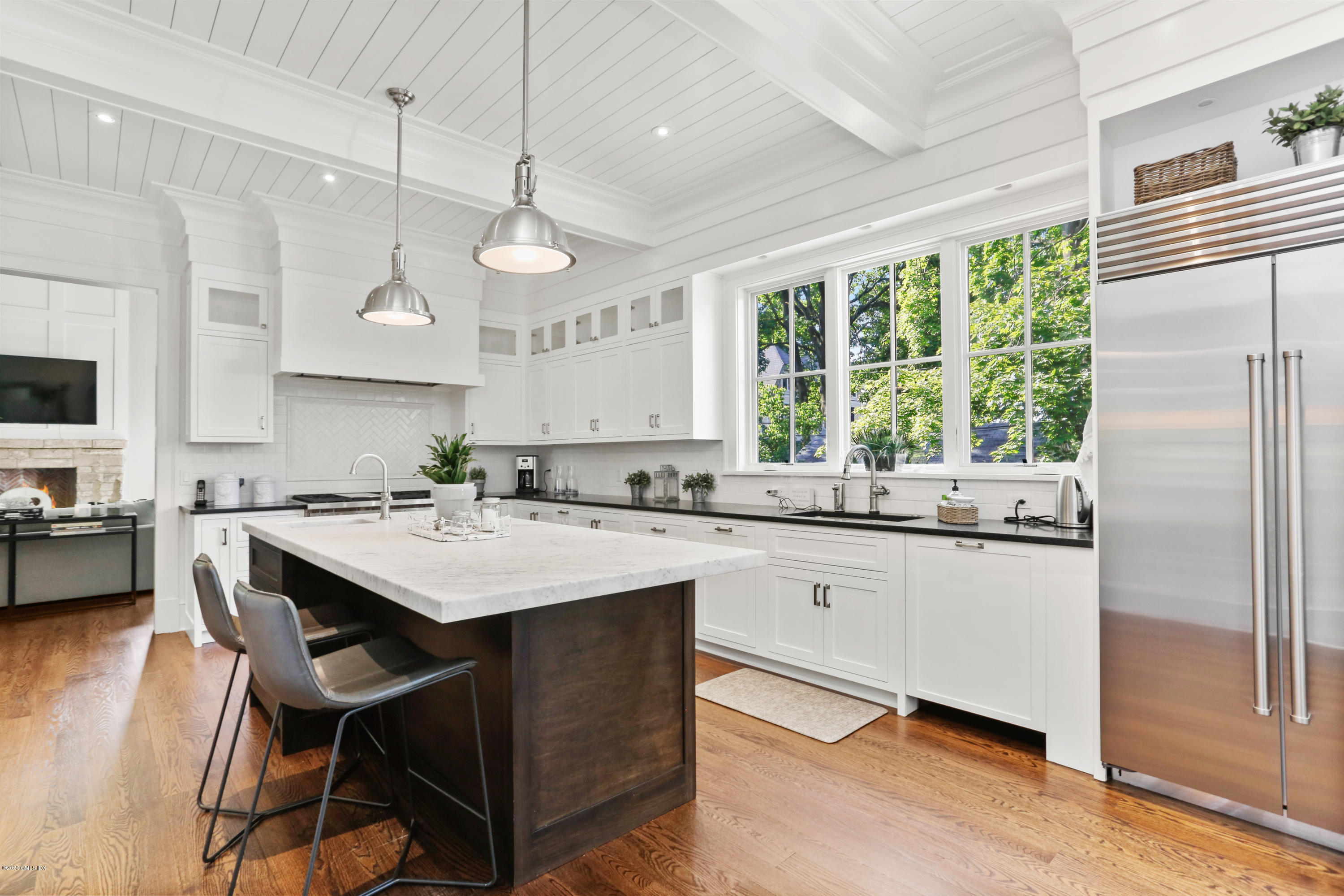 3 Juniper Lane Riverside, CT 06878 - Photo 13 of 46 a kitchen with stainless steel appliances granite countertop a stove a sink dishwasher a refrigerator white cabinets and wooden floor