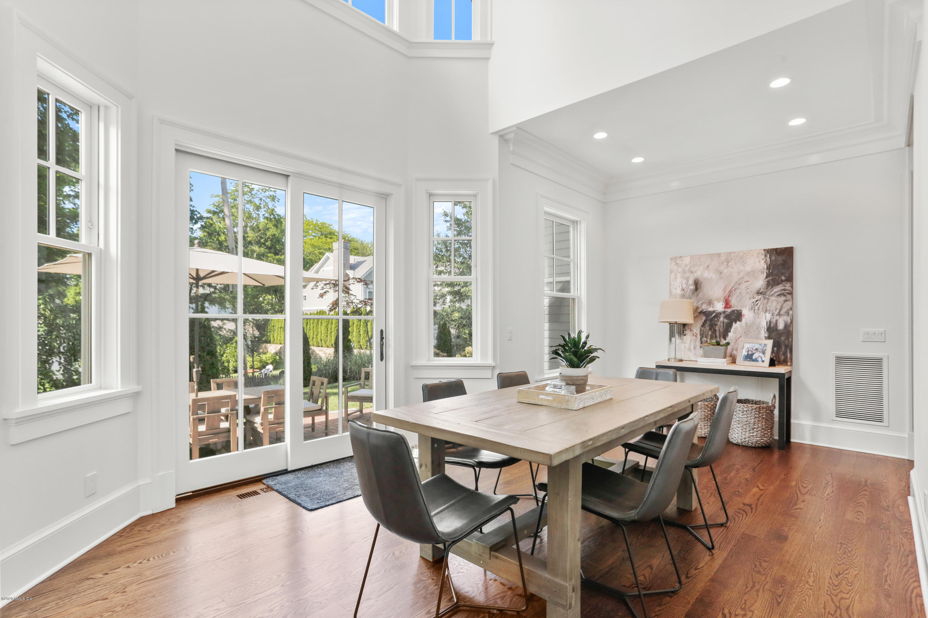 3 Juniper Lane Riverside, CT 06878 - Photo 16 of 46 a view of a dining room with furniture window and wooden floor