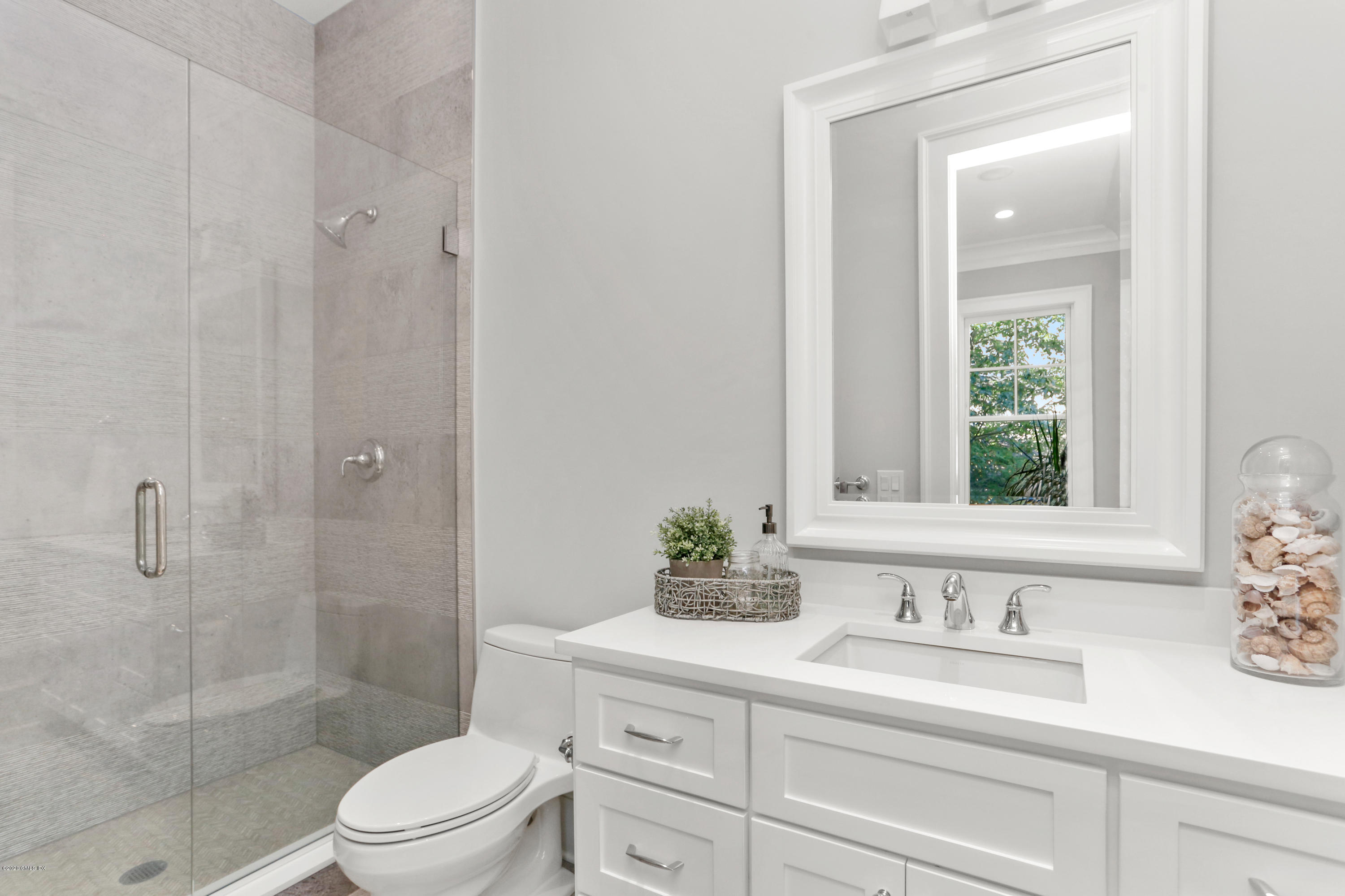 3 Juniper Lane Riverside, CT 06878 - Photo 18 of 46 a bathroom with a sink a toilet and shower