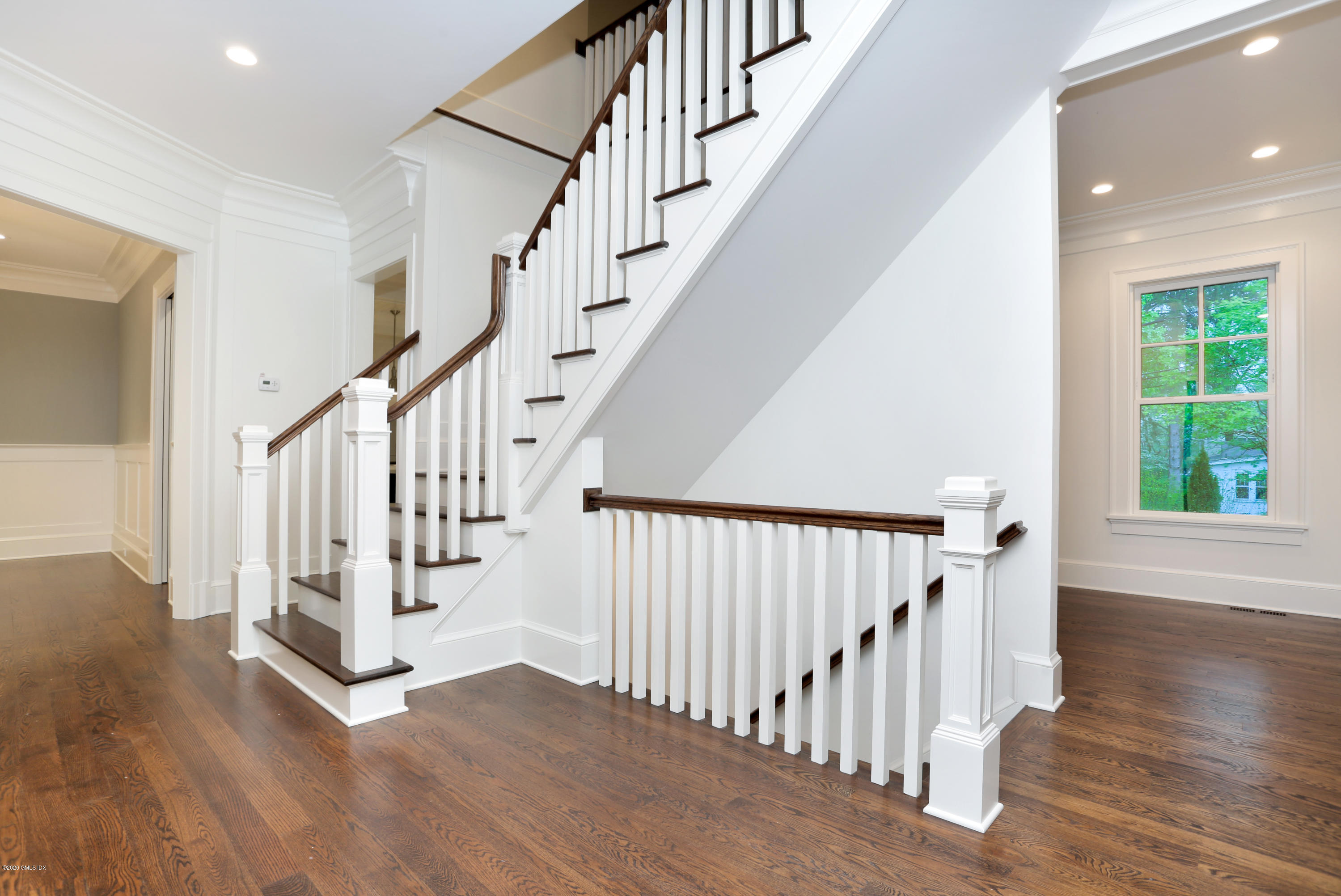 3 Juniper Lane Riverside, CT 06878 - Photo 22 of 46 a view of staircase with wooden floor and white walls