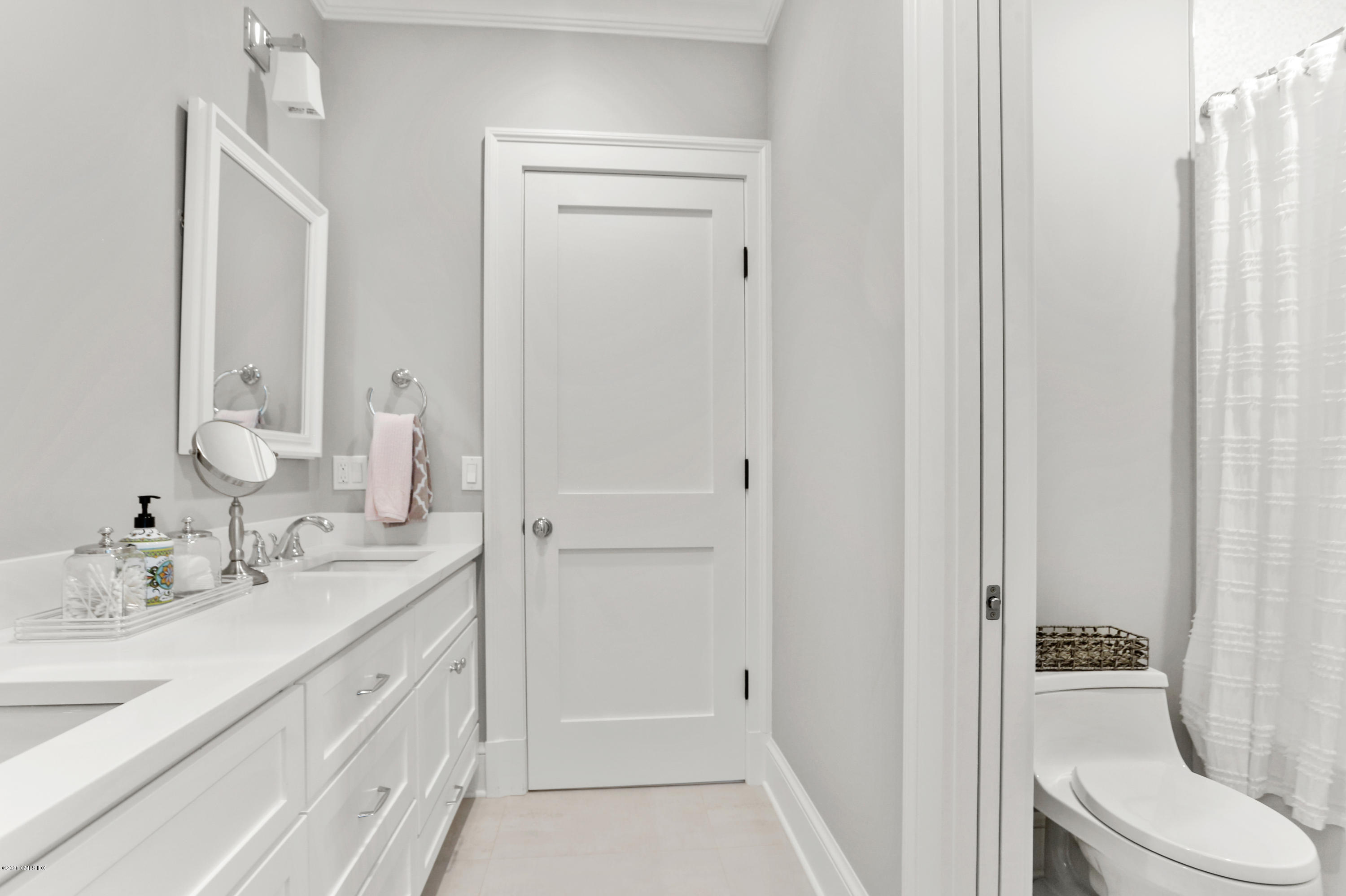 3 Juniper Lane Riverside, CT 06878 - Photo 31 of 46 a bathroom with a sink a toilet and shower