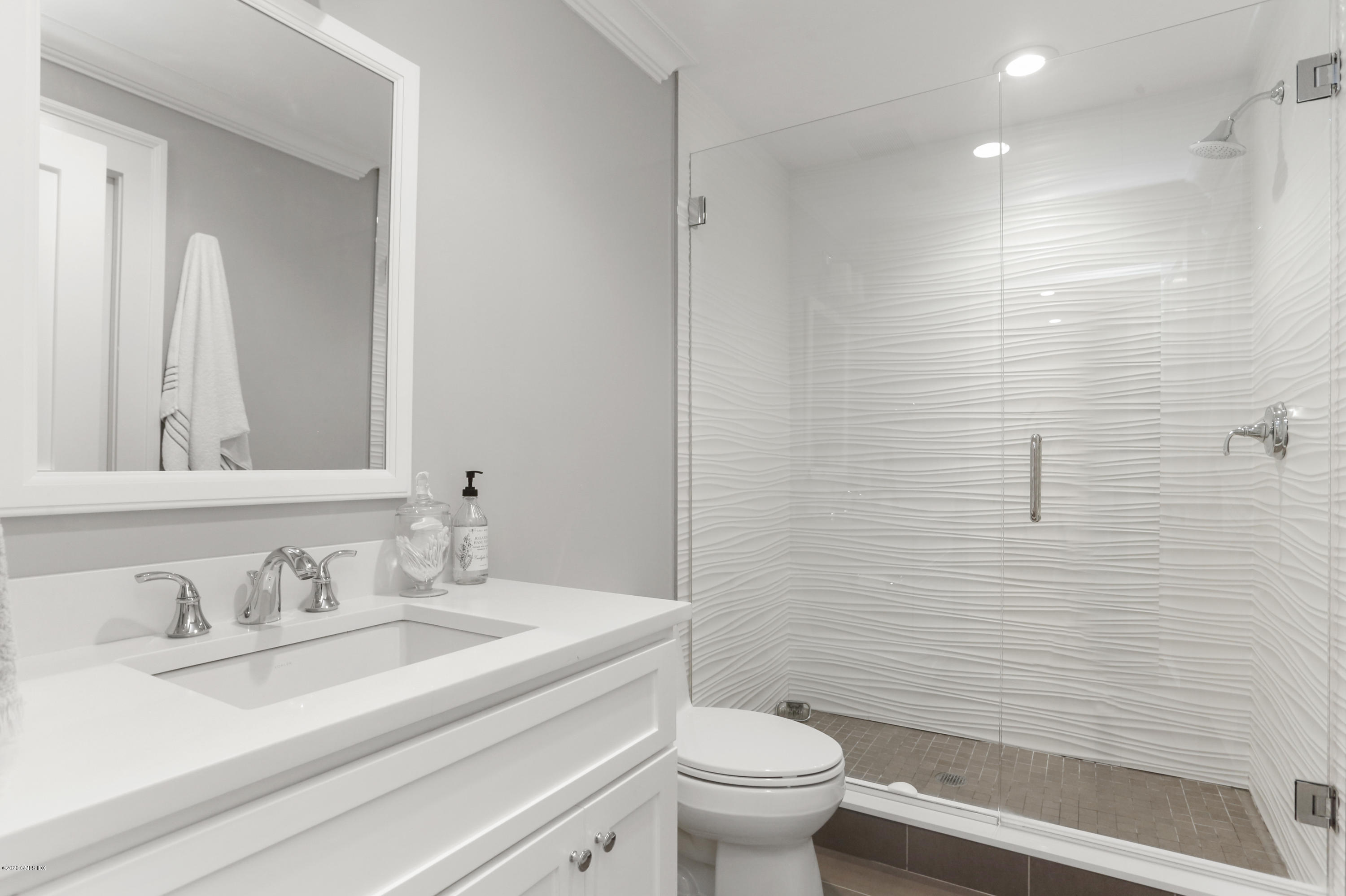 3 Juniper Lane Riverside, CT 06878 - Photo 39 of 46 a bathroom with a granite countertop sink a toilet and a mirror