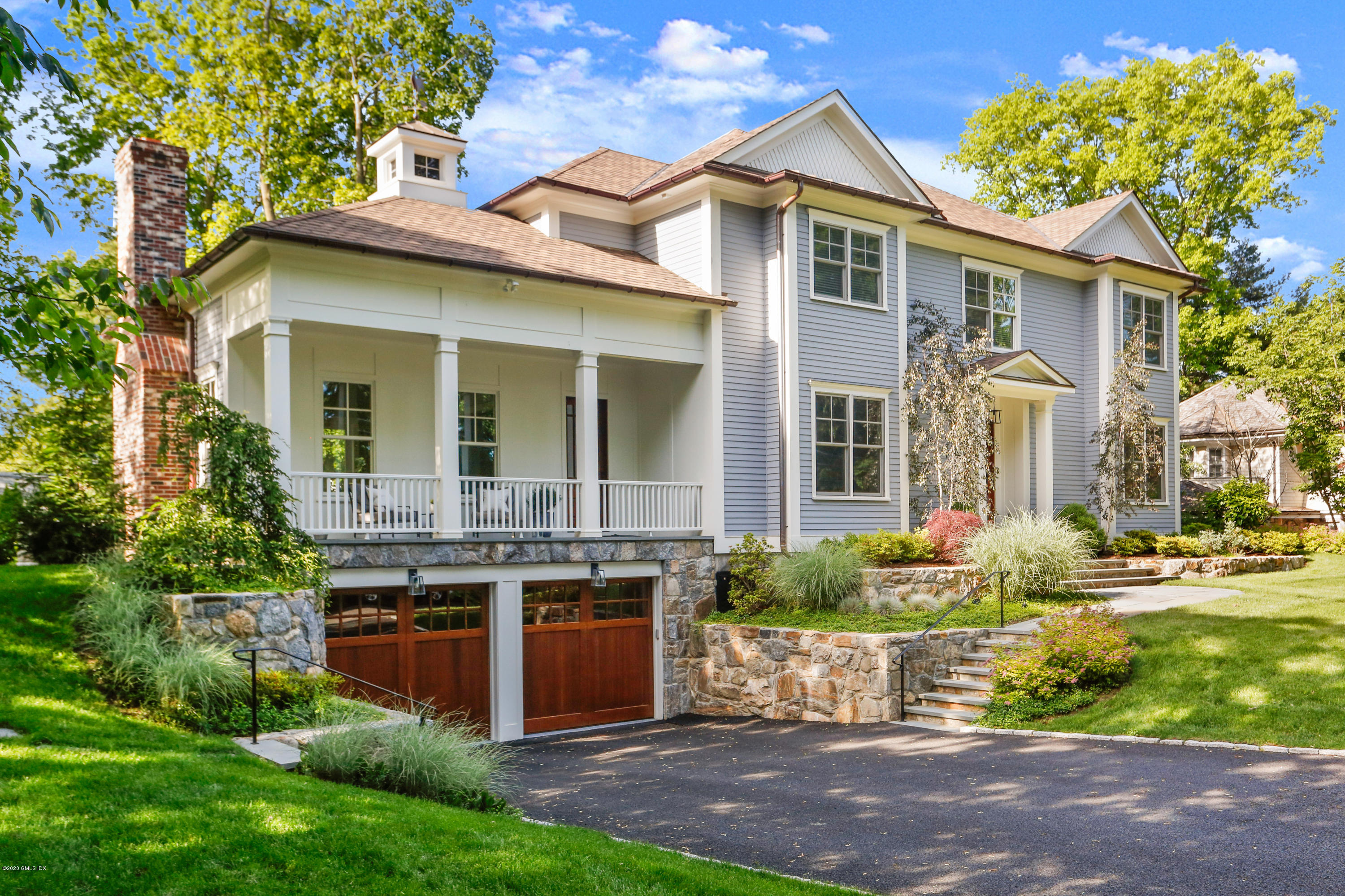 3 Juniper Lane Riverside, CT 06878 - Photo 4 of 46 a front view of a house with garden
