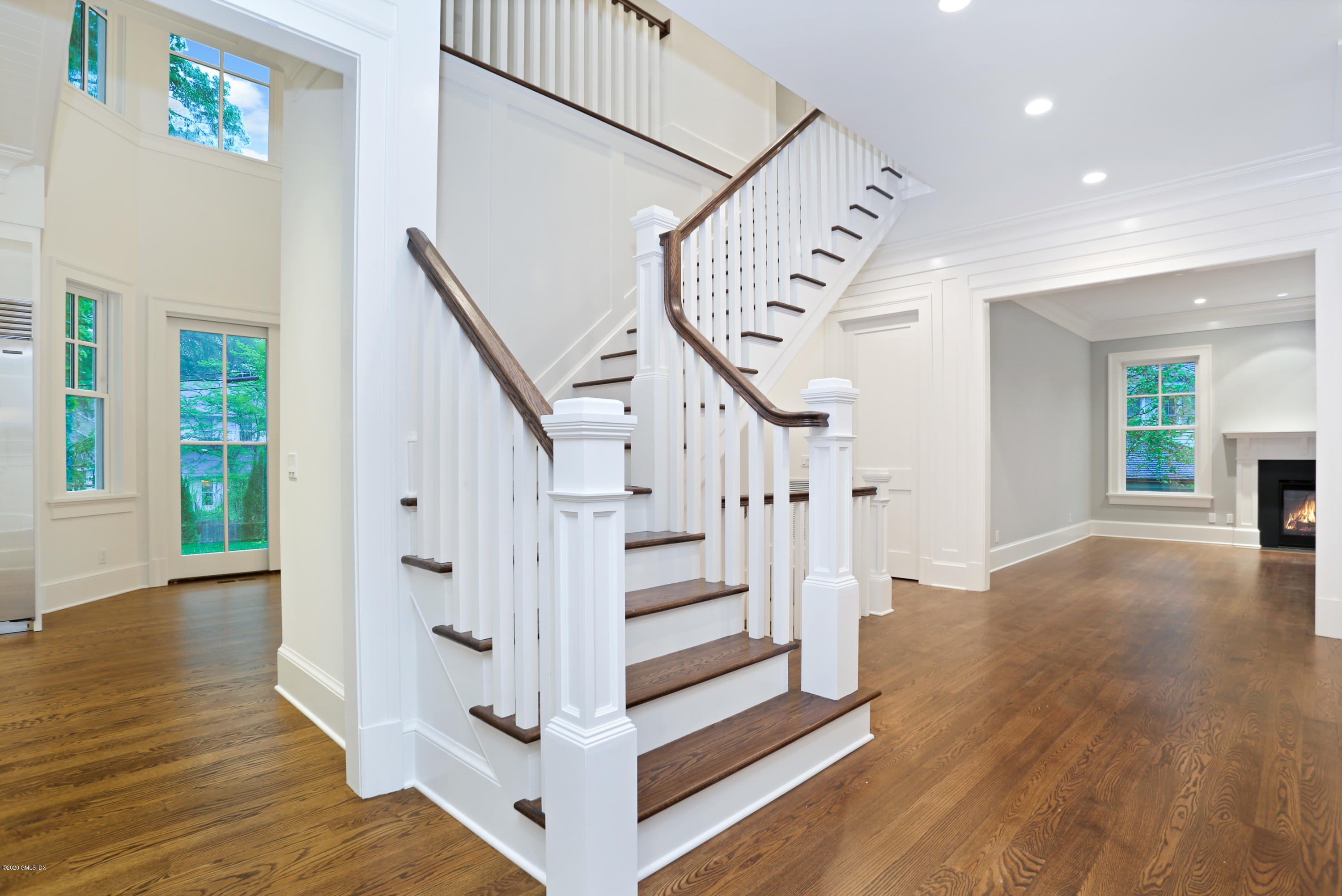 3 Juniper Lane Riverside, CT 06878 - Photo 5 of 46 a view of entryway with wooden floor and stairs