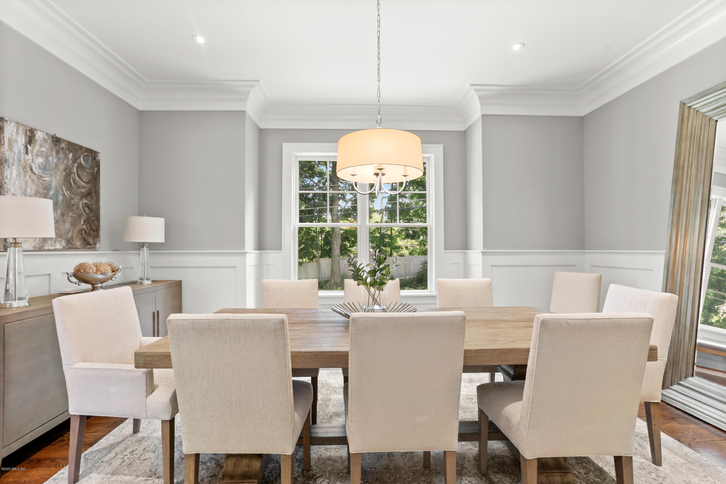 3 Juniper Lane Riverside, CT 06878 - Photo 10 of 46 a dining room with furniture a chandelier and wooden floor