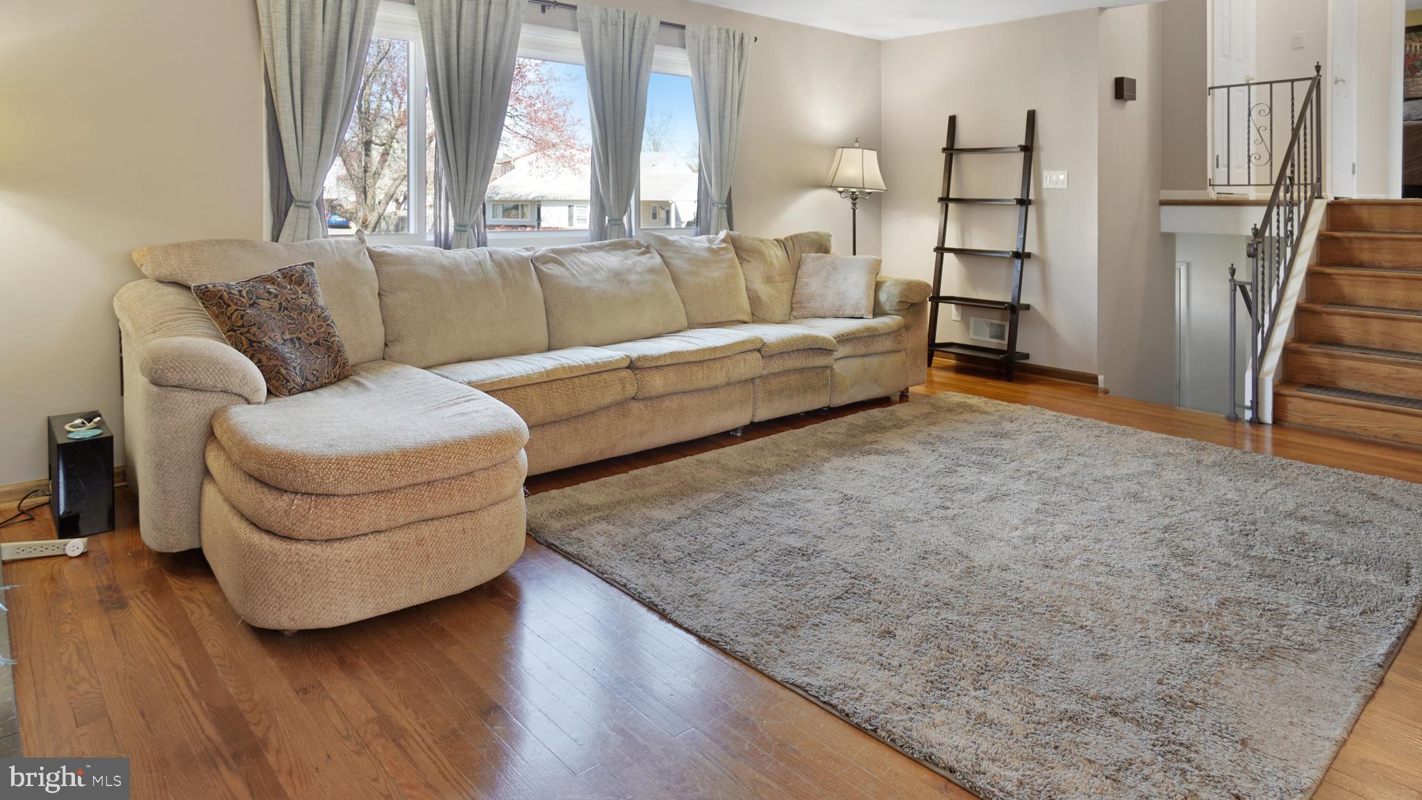 203 Ridgely Road Glen Burnie, MD 21061 - Photo 6 of 35 Living room offers large window for lots of light
