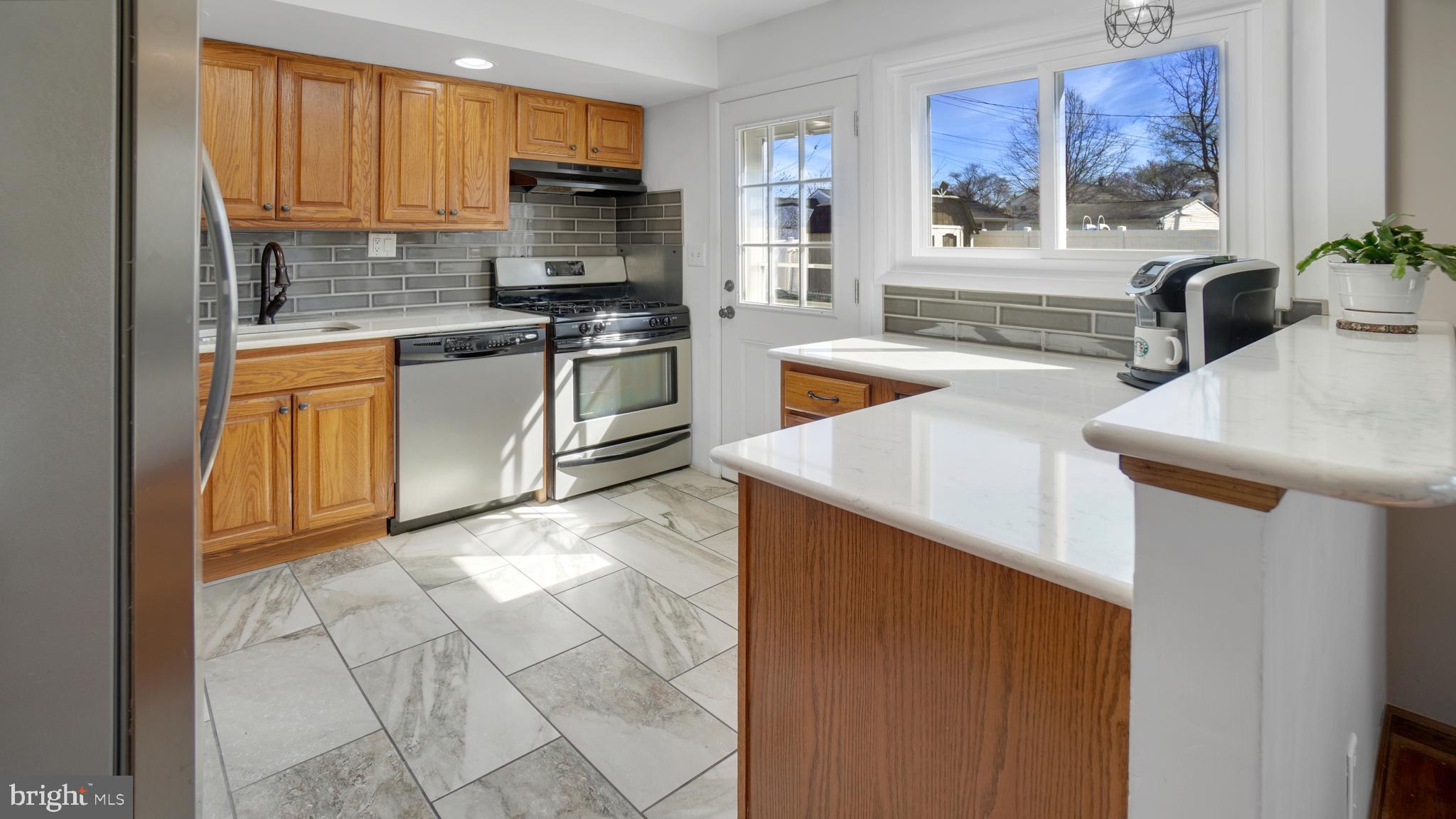 203 Ridgely Road Glen Burnie, MD 21061 - Photo 8 of 35 Bright and light kitchen - New windows throughout