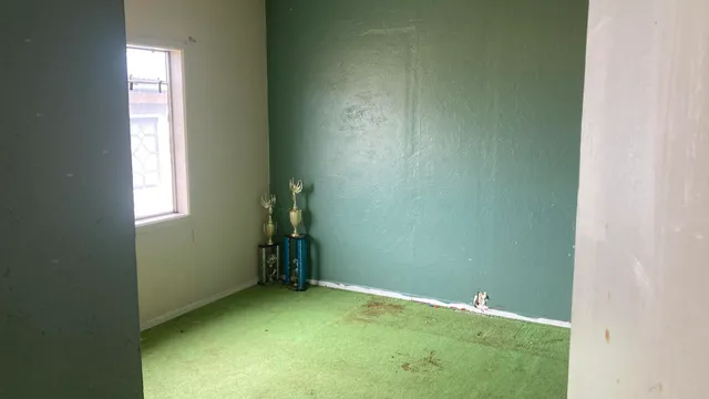 an empty room with windows