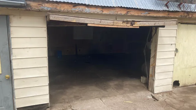 a view of a room with a wooden floor