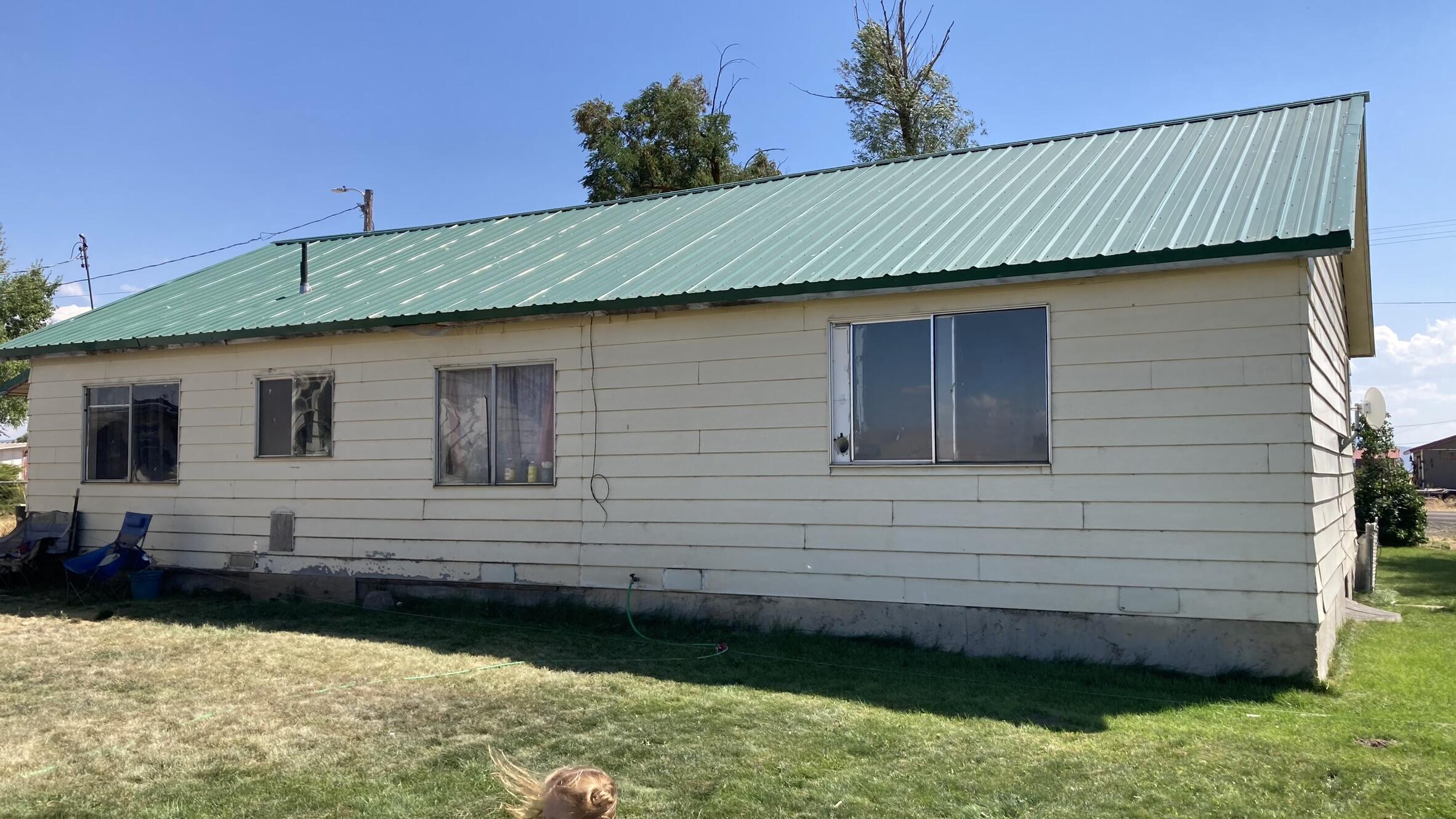 657-525 Susanville Road Bieber, CA 96009 - Photo 3 of 26 a front view of a house with garden