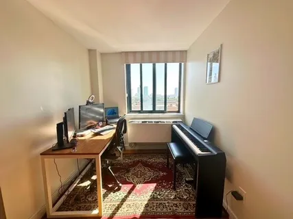 a room with furniture and a window