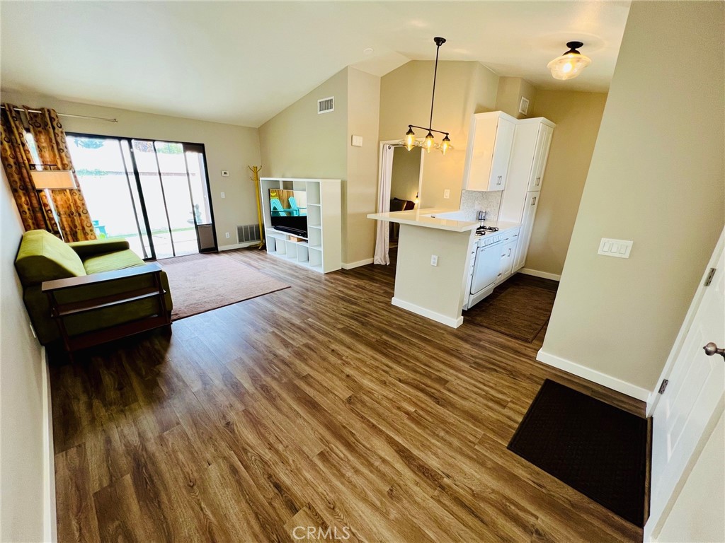 9505 Arlington Avenue, Unit 29 Riverside, CA 92503 - Photo 5 of 21 a living room with furniture and a fireplace