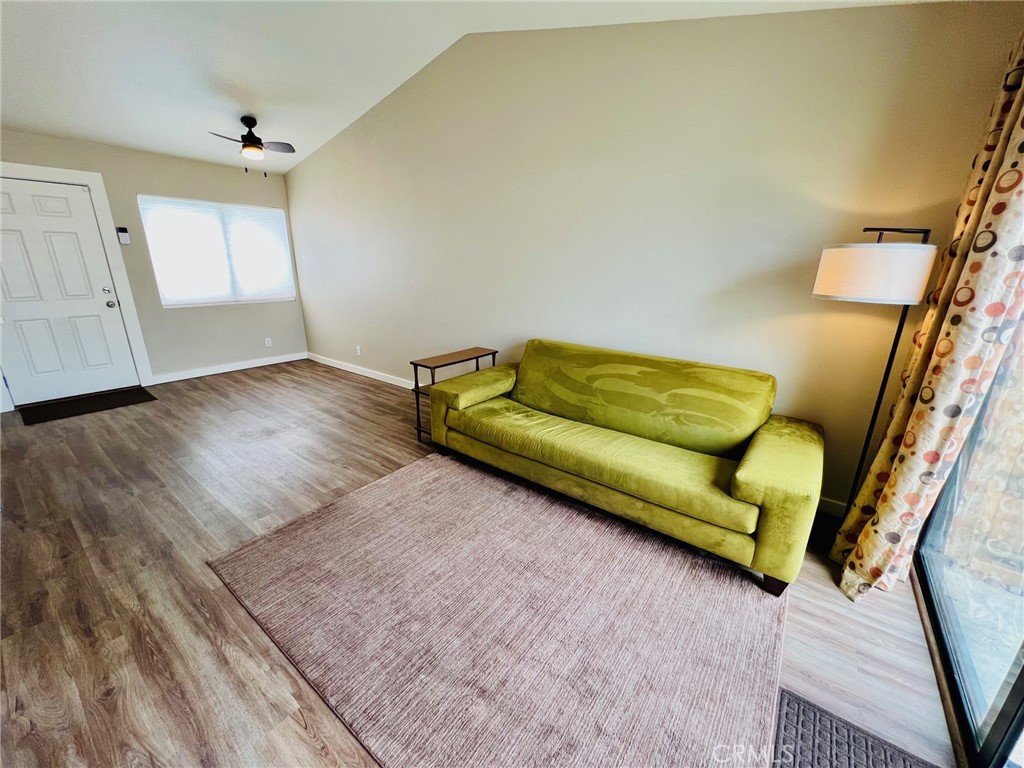 9505 Arlington Avenue, Unit 29 Riverside, CA 92503 - Photo 10 of 21 a living room with couches and a rug